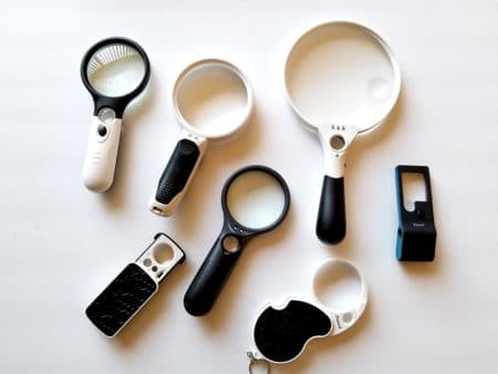 A group of handheld magnifiers. Handheld magnifiers let you see cannabis buds closer, but they don't get close enough to easily judge the color of trichomes.