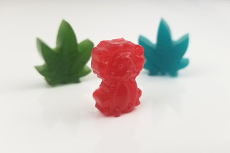 A cannabis gummy lion hanging out the the cannabis gummy Serengeti