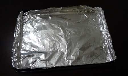 Line a baking sheet with aluminum foil so the buds won't stick to your pan