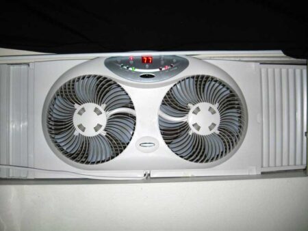 A classy window fan exhausting heat doesn't look too suspicious and can help with temperatures in a cannabis grow room