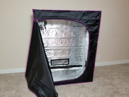 Pull the jacket over the bars for a fully assembled grow tent.