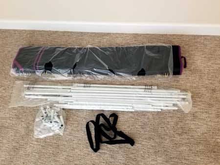 Lay out all the parts of your cannabis grow tent to assemble.