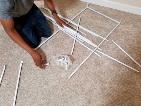 Start putting cannabis grow tent together according to directions.